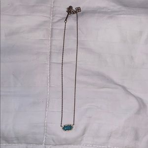blue and gold kendra scott necklace